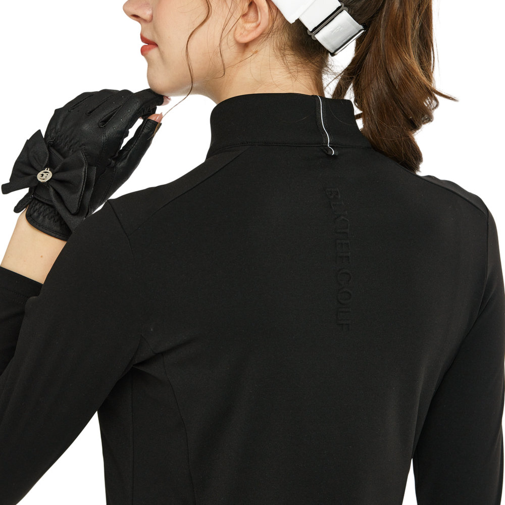 Sweatshirt turtleneck putih dengan zip pepenjuru